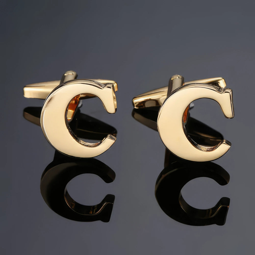 *Buchstabe C Manschettenköpfe, Gold